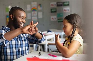 People communicating in sign language